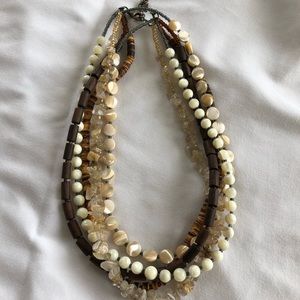 Multi strand Silpada necklace. Browns and creams. Adjustable to 18 inches.
